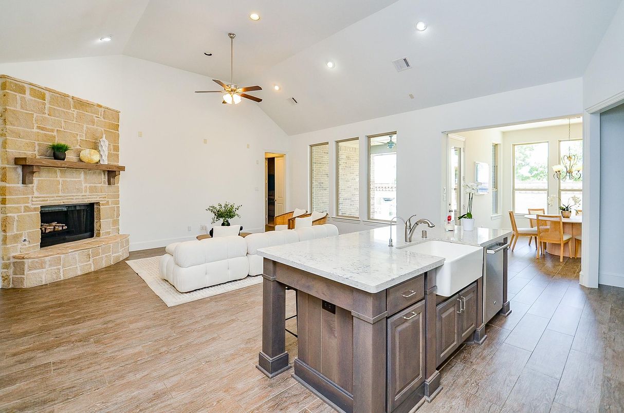 Dining room, Fireplace, Interior, Kitchen, Living room, Recessed Lighting, Stone Walls, Wood Texture Flooring