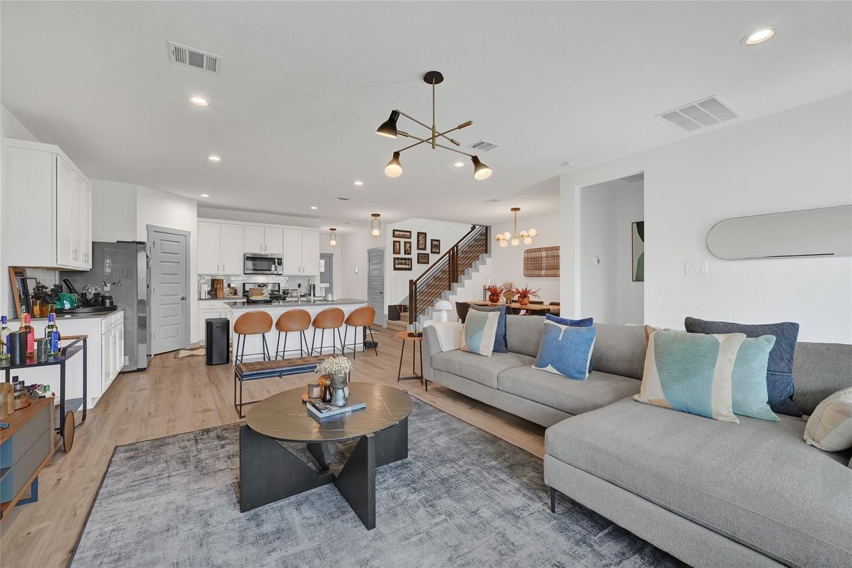 Dining room, Interior, Kitchen, Living room, Pendant Lights, Recessed Lighting, Stainless Steel Appliances, Wood Texture Flooring