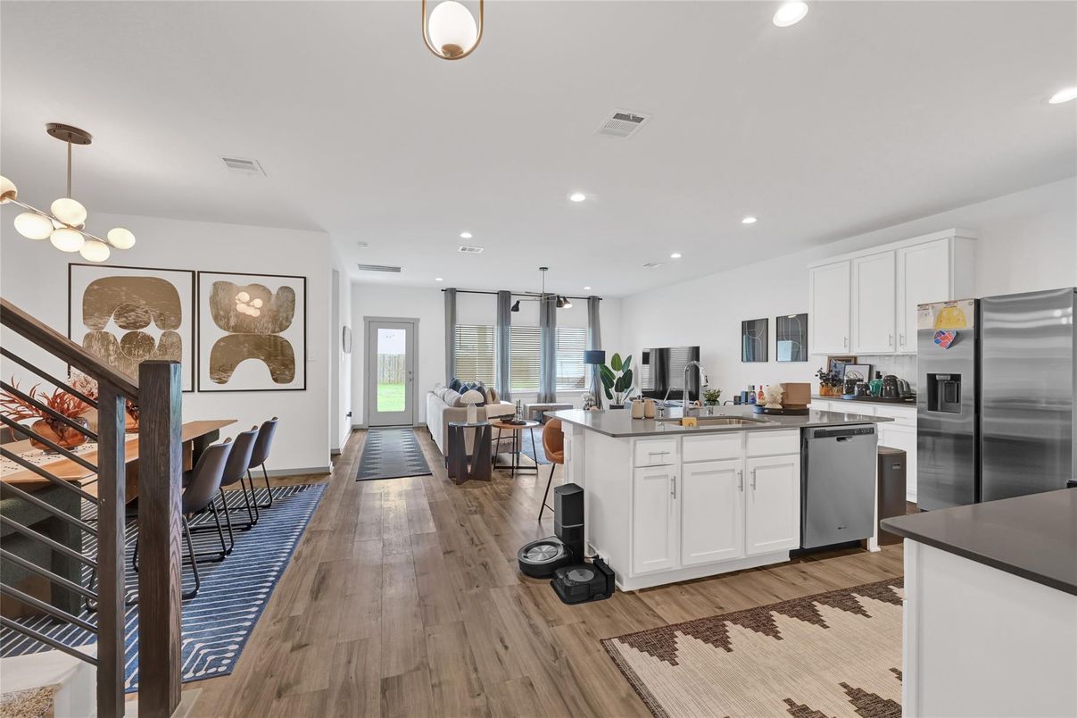 Dining room, Interior, Kitchen, Pendant Lights, Recessed Lighting, Stainless Steel Appliances, Wood Texture Flooring