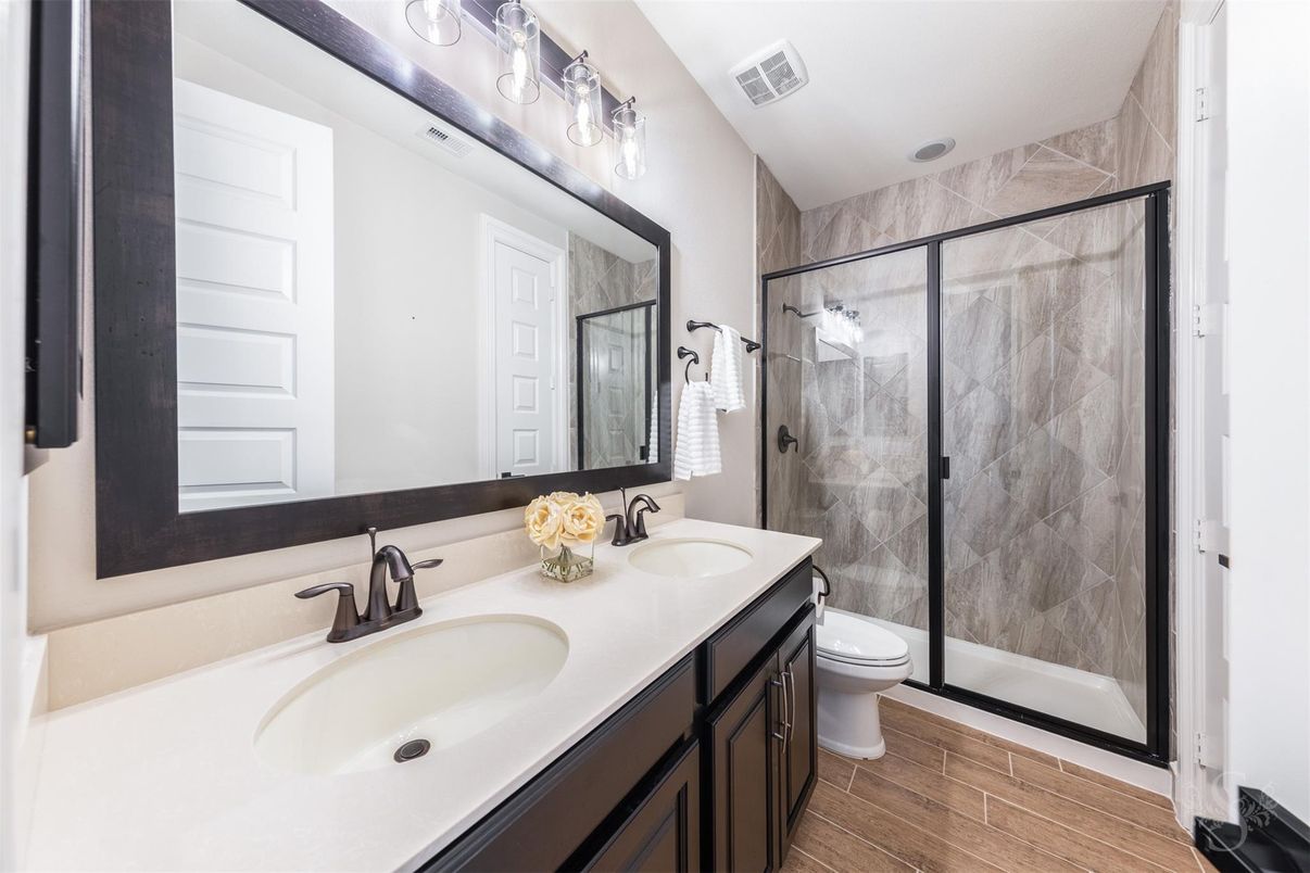 Bathroom, Dual Sink Vanities, Glass Shower, Interior, Wood Texture Flooring