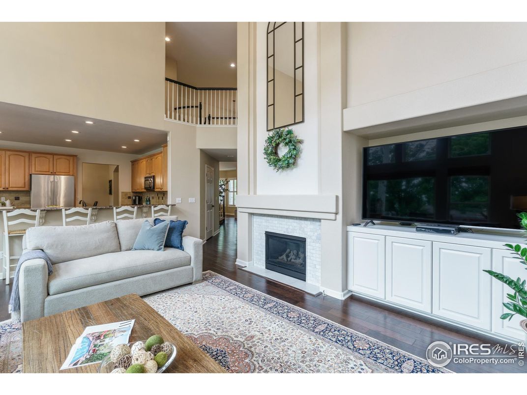 Fireplace, Interior, Kitchen, Living room, Recessed Lighting, Stainless Steel Appliances, Wood Texture Flooring