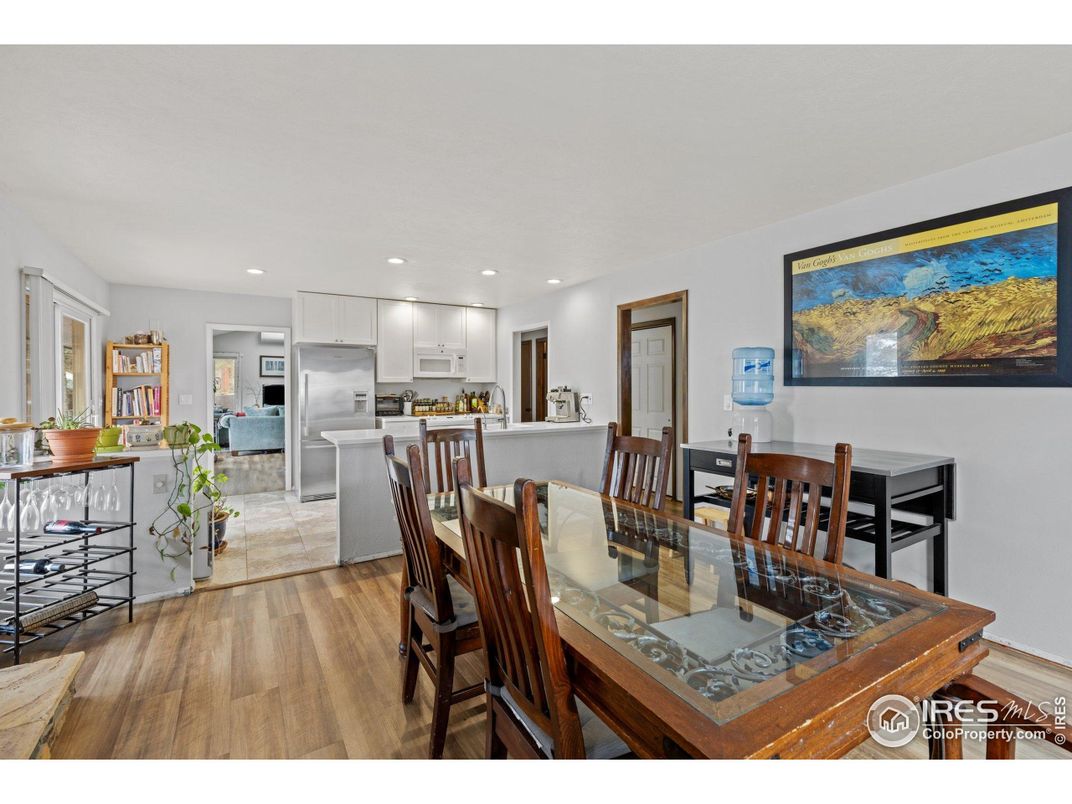 Dining room, Interior, Kitchen, Recessed Lighting, Stainless Steel Appliances, Wood Texture Flooring