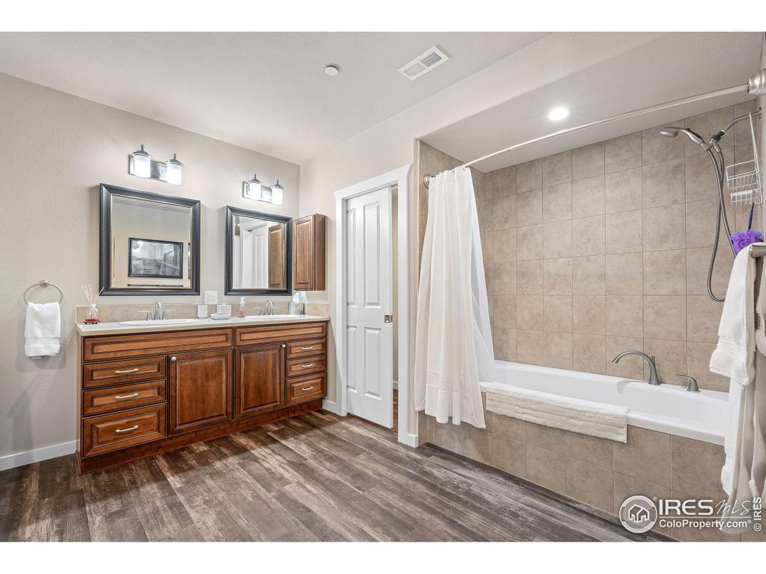 Bathroom, Dual Sink Vanities, Interior, Recessed Lighting, Wood Texture Flooring