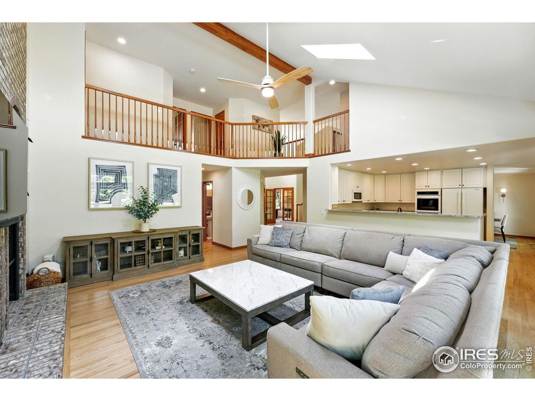 Fireplace, Interior, Kitchen, Living room, Recessed Lighting, Stainless Steel Appliances, Wood Texture Flooring