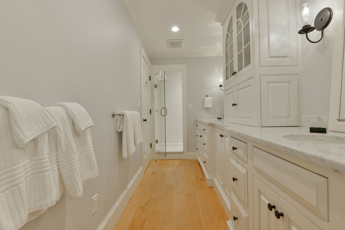 Bathroom, Dual Sink Vanities, Interior, Recessed Lighting, Wood Texture Flooring