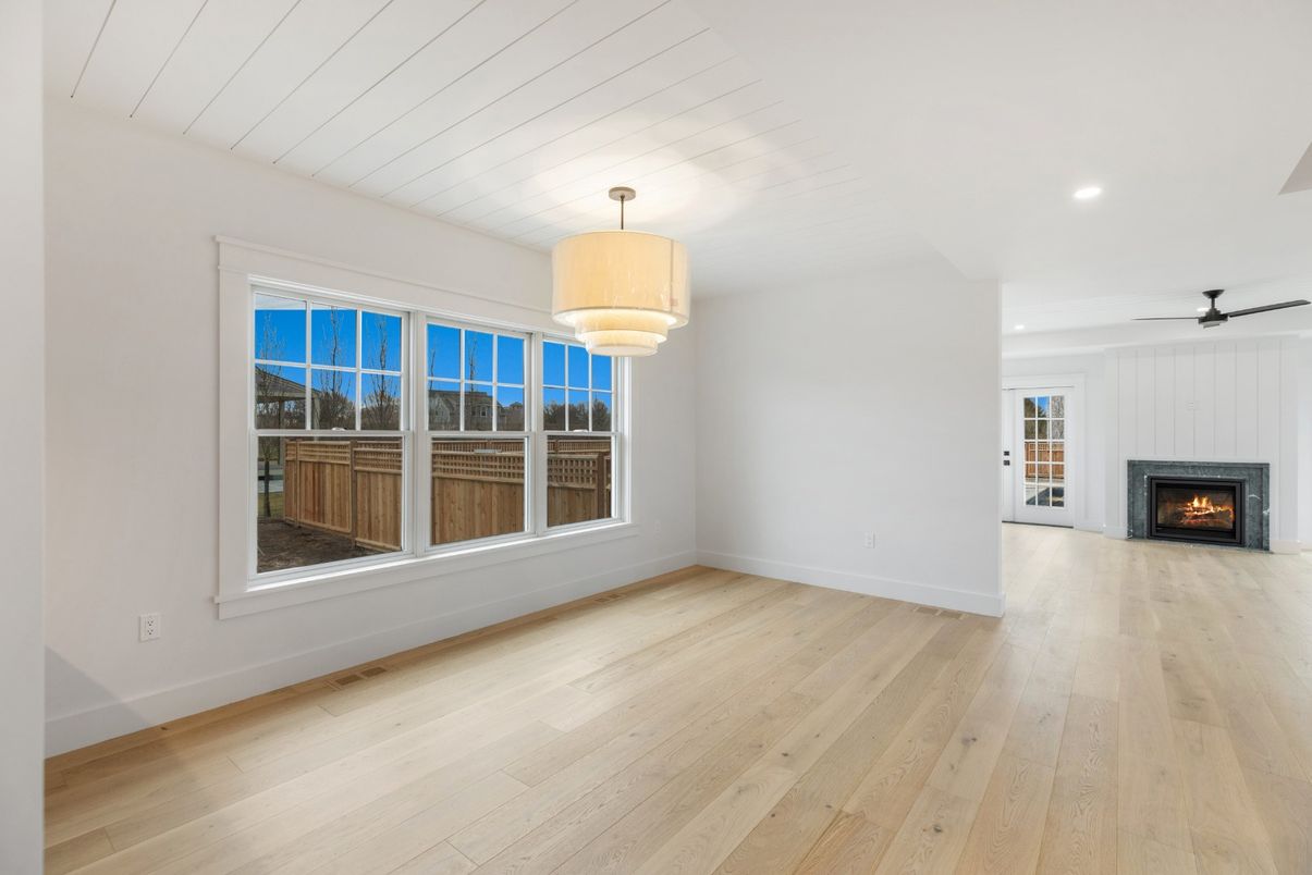 Chandelier, Empty room, Fireplace, Interior, Recessed Lighting, Wood Texture Flooring
