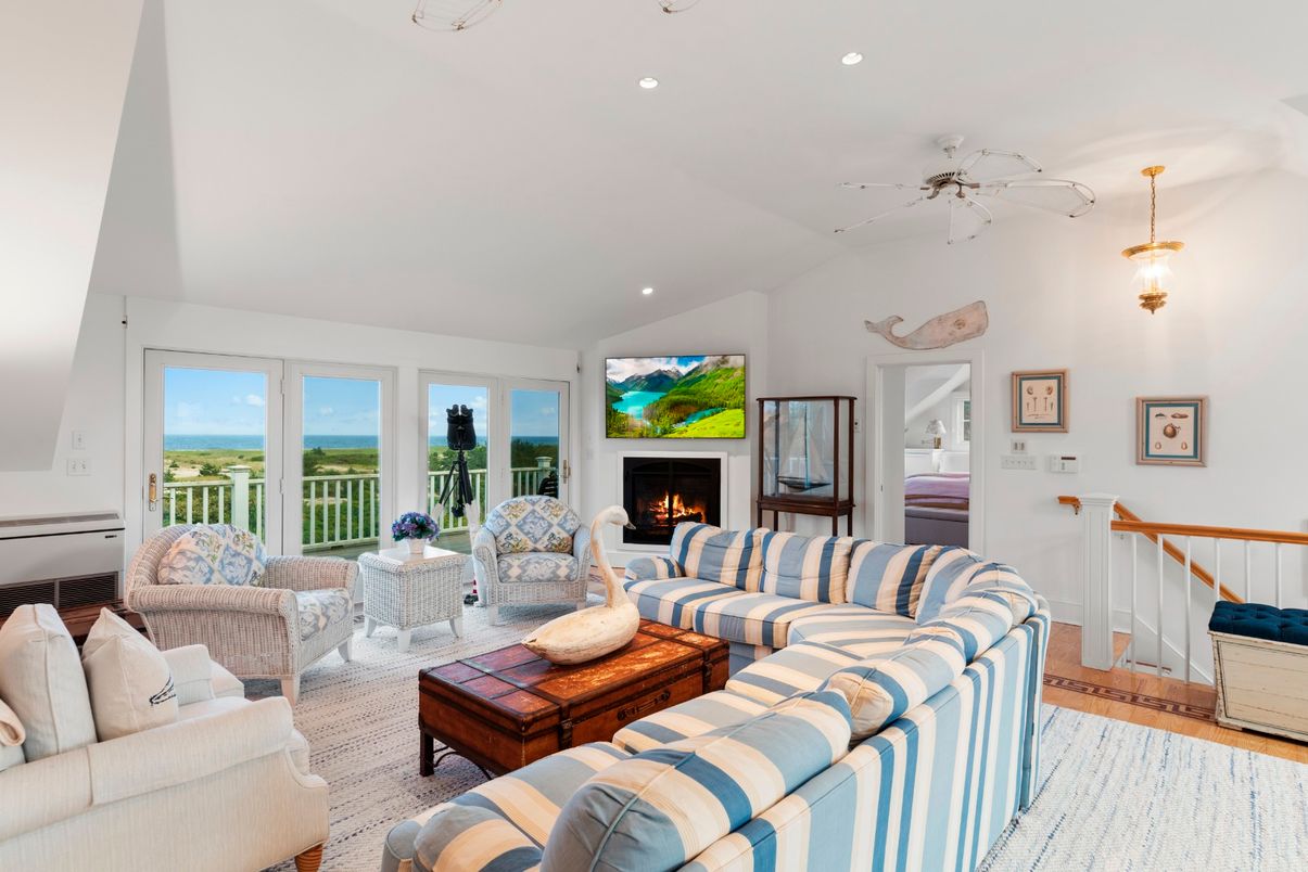 Fireplace, Interior, Living room, Pendant Lights, Recessed Lighting, Water, Wood Texture Flooring