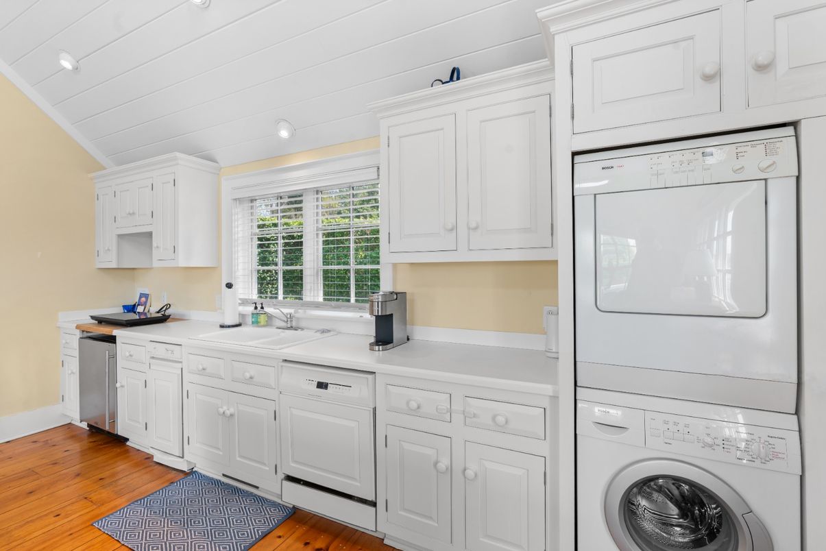 Interior, Kitchen, Recessed Lighting, Washer, Wood Texture Flooring