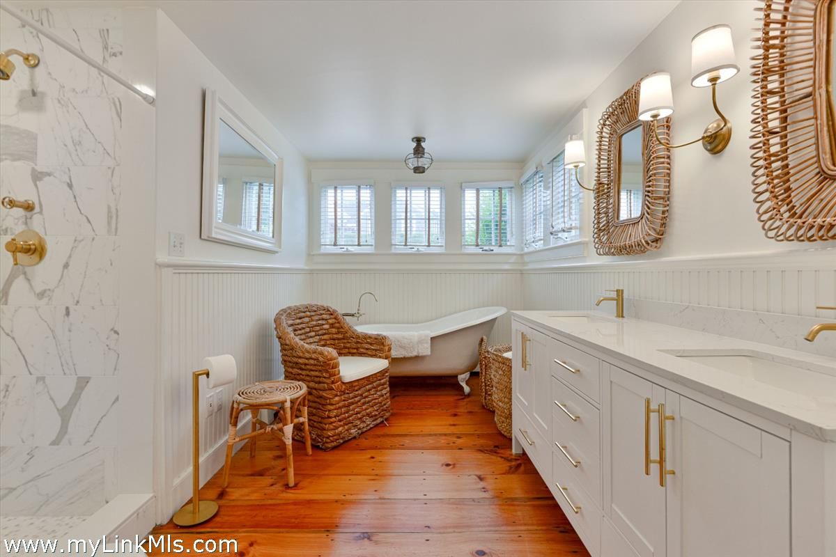 Bathroom, Dual Sink Vanities, Interior, Marble Walls, Wood Texture Flooring