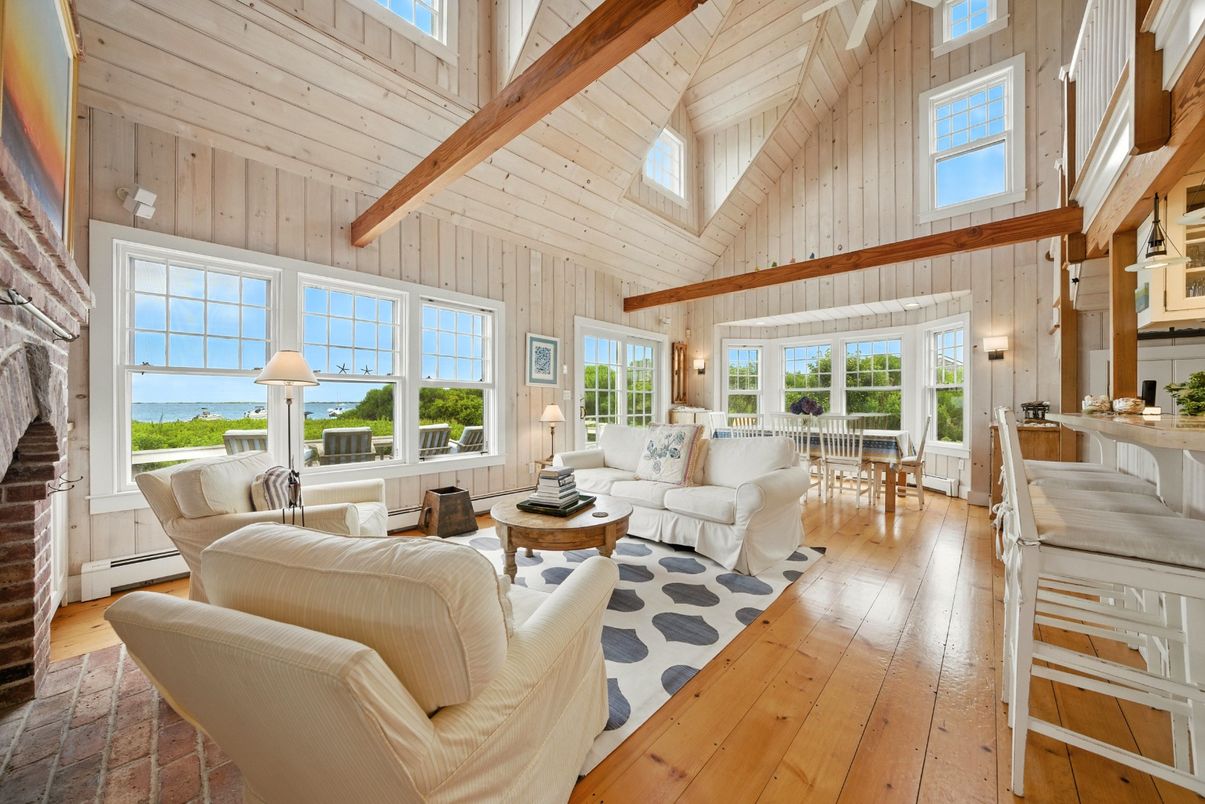 Dining room, Fireplace, Interior, Living room, Water, Wooden Beams, Wood Texture Flooring, Wooden Walls
