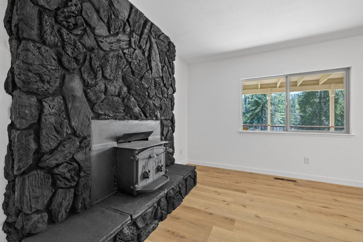 Empty room, Fireplace, Interior, Recessed Lighting, Wood Texture Flooring