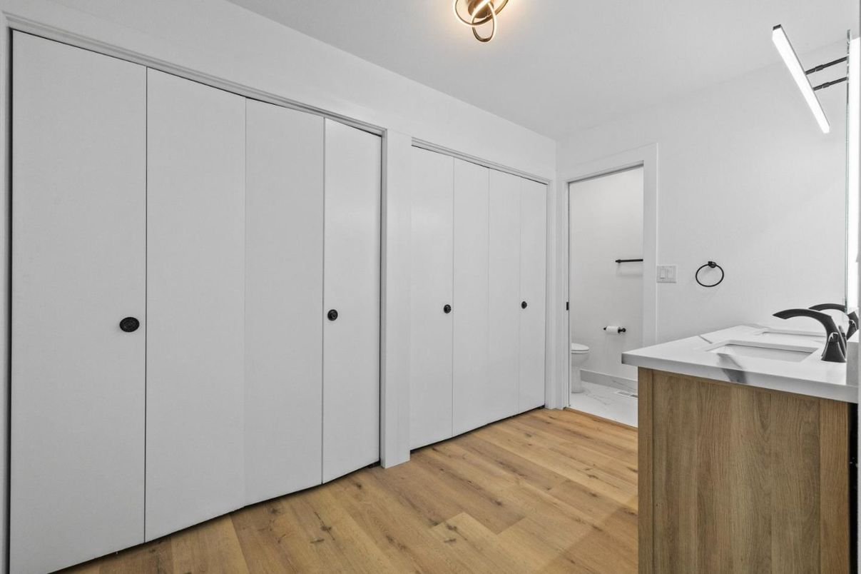 Bathroom, Dual Sink Vanities, Glass Shower, Interior, Marble, Marble Walls, Recessed Lighting