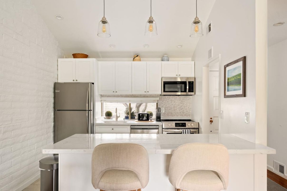 Interior, Kitchen, Pendant Lights, Recessed Lighting, Stainless Steel Appliances, Stone Walls, Wood Texture Flooring