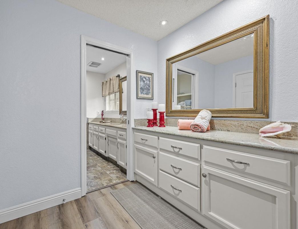 Bathroom, Dual Sink Vanities, Interior, Recessed Lighting, Wood Texture Flooring