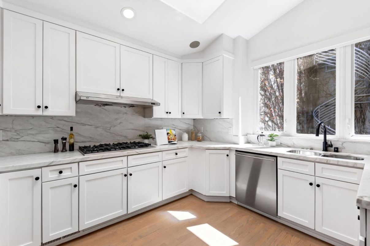 Interior, Kitchen, Marble Walls, Recessed Lighting, Stainless Steel Appliances, Wood Texture Flooring