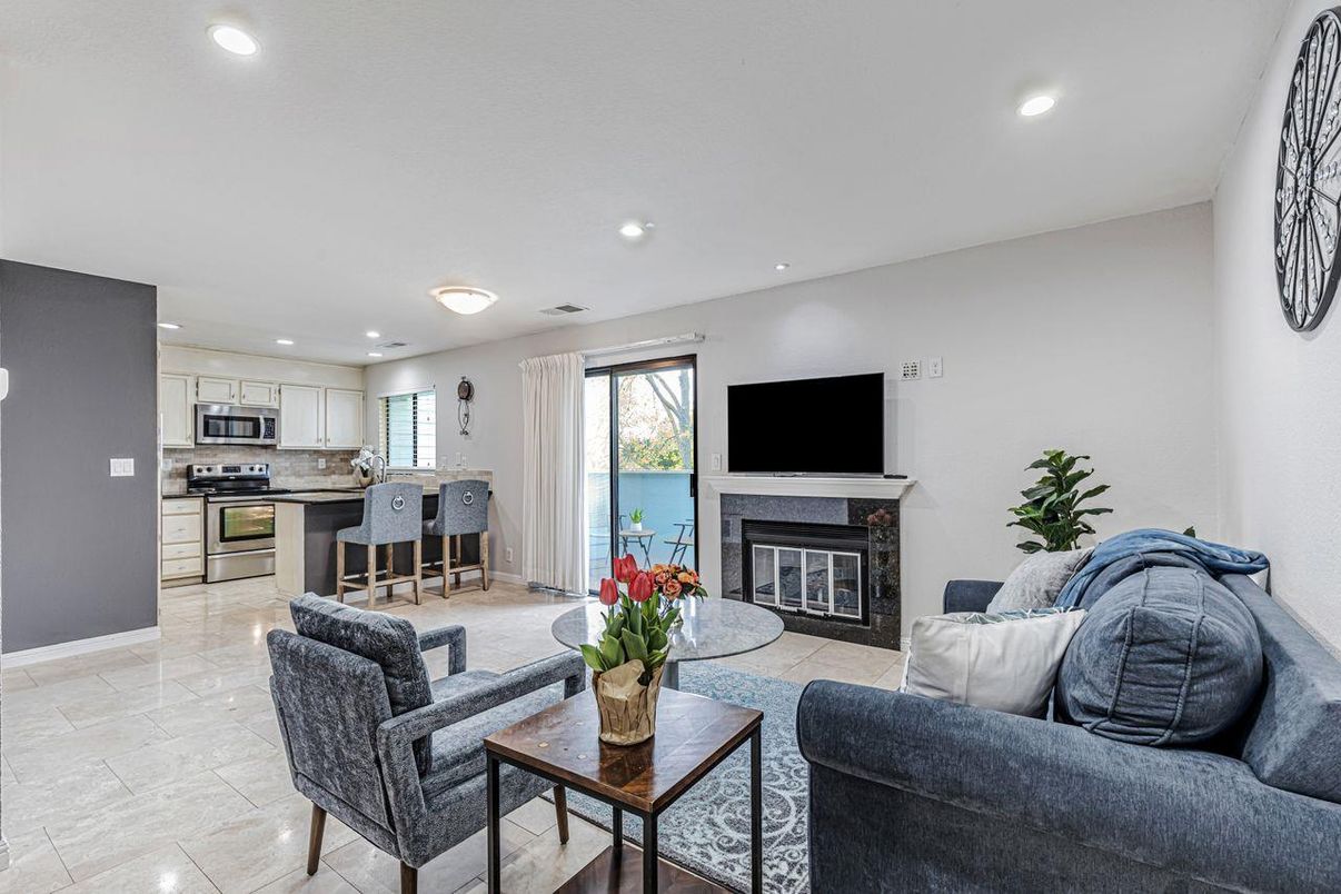 Fireplace, Interior, Kitchen, Living room, Recessed Lighting, Stainless Steel Appliances
