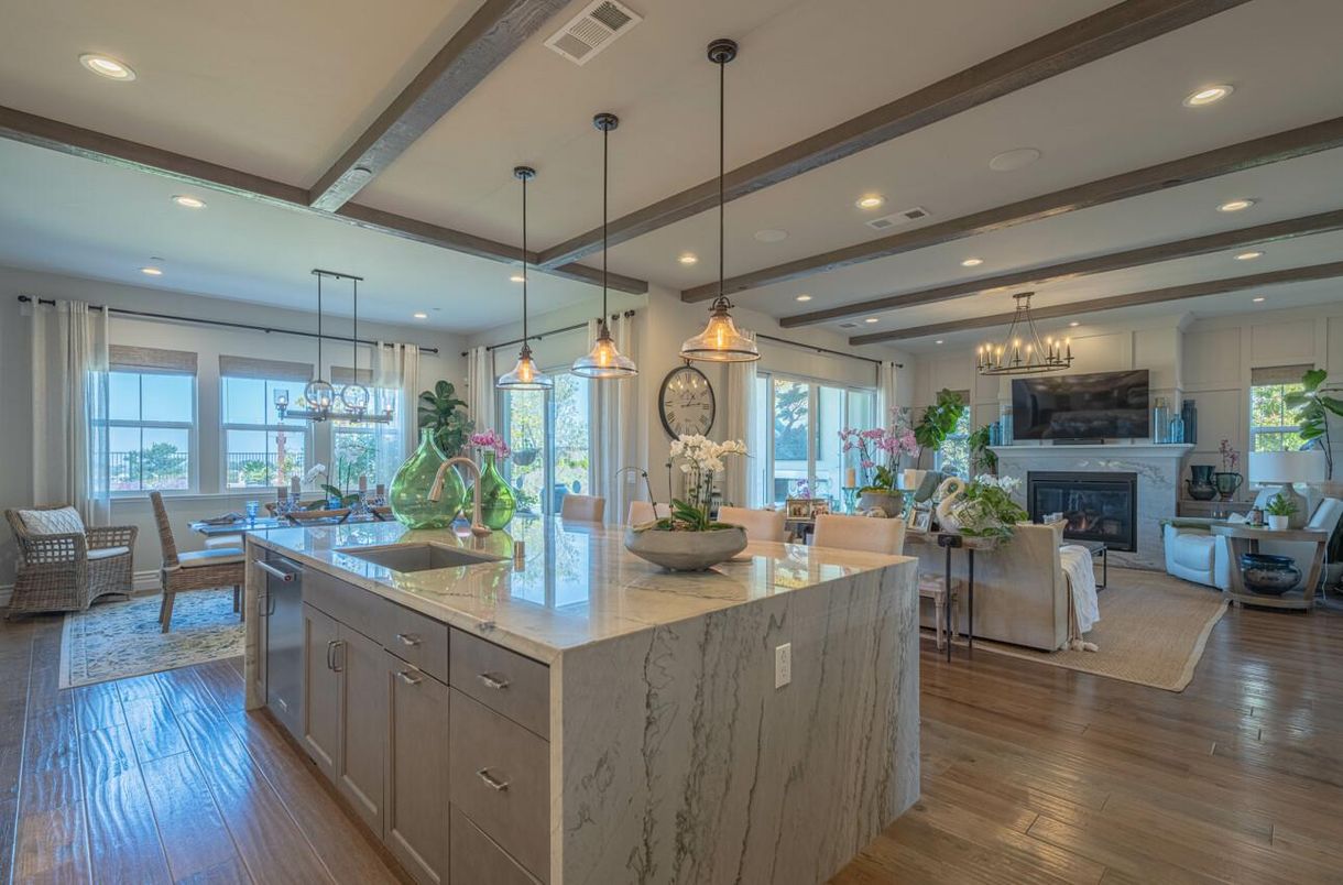 Chandelier, Dining room, Fireplace, Interior, Kitchen, Living room, Pendant Lights, Recessed Lighting, Stainless Steel Appliances, Wooden Beams, Wood Texture Flooring