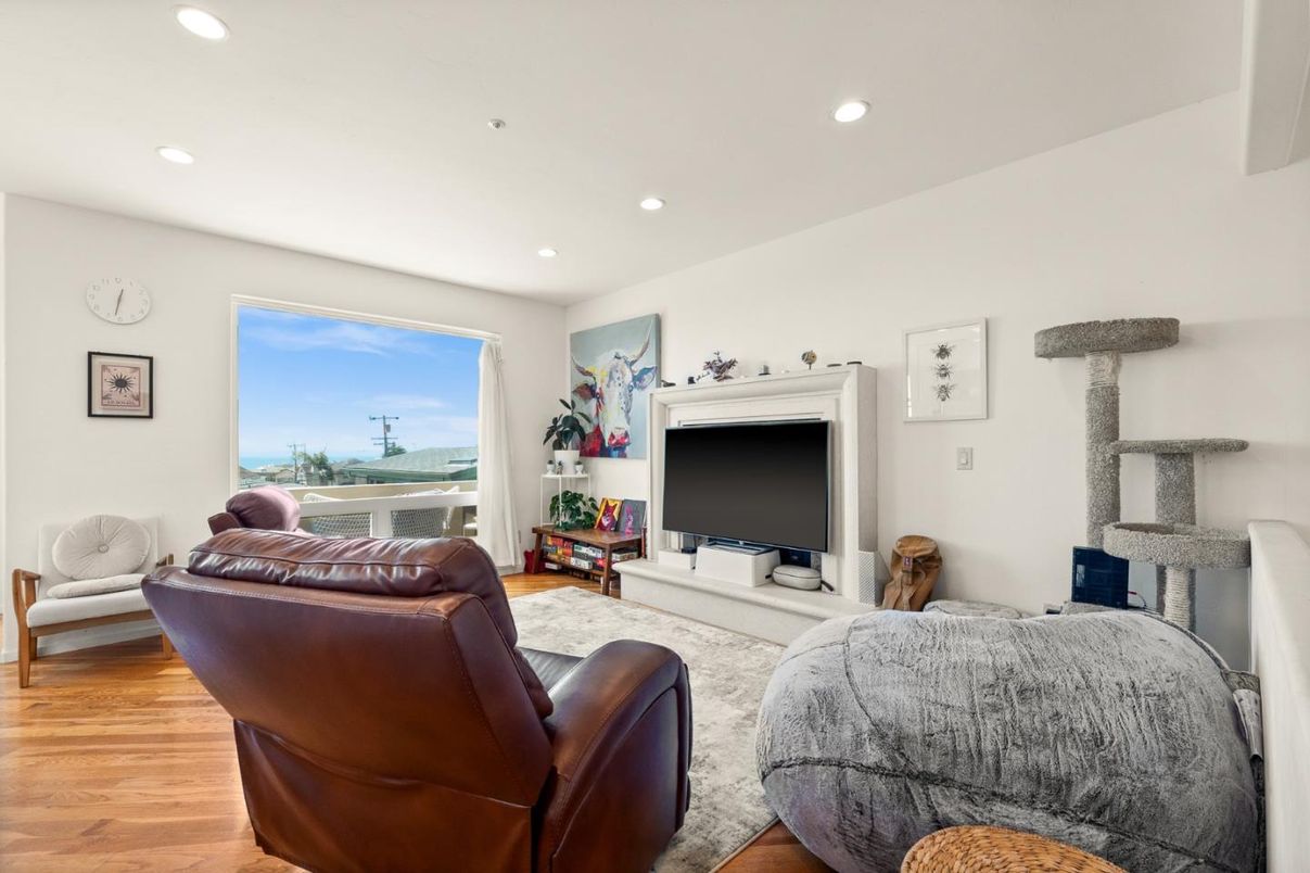 Bedroom, Fireplace, Interior, Living room, Recessed Lighting, Water, Wood Texture Flooring