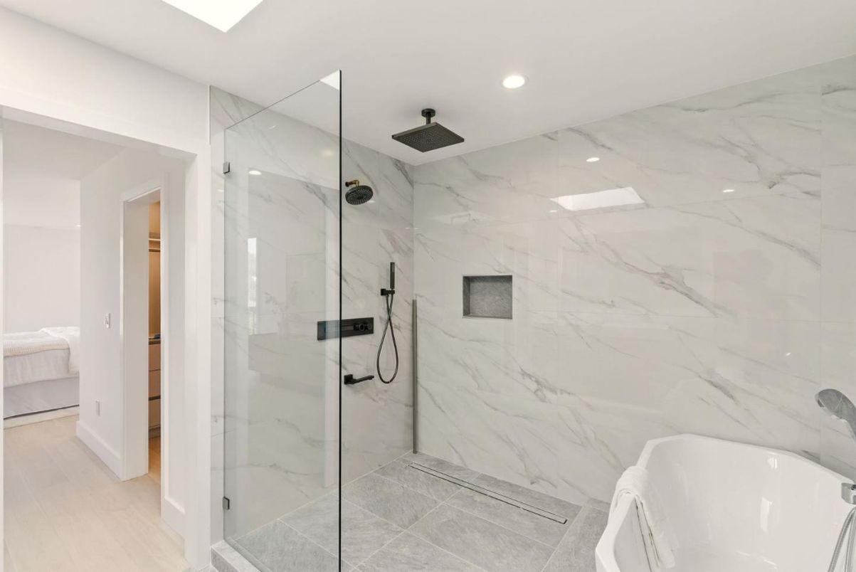 Bathroom, Glass Shower, Interior, Marble Walls, Recessed Lighting, Wood Texture Flooring