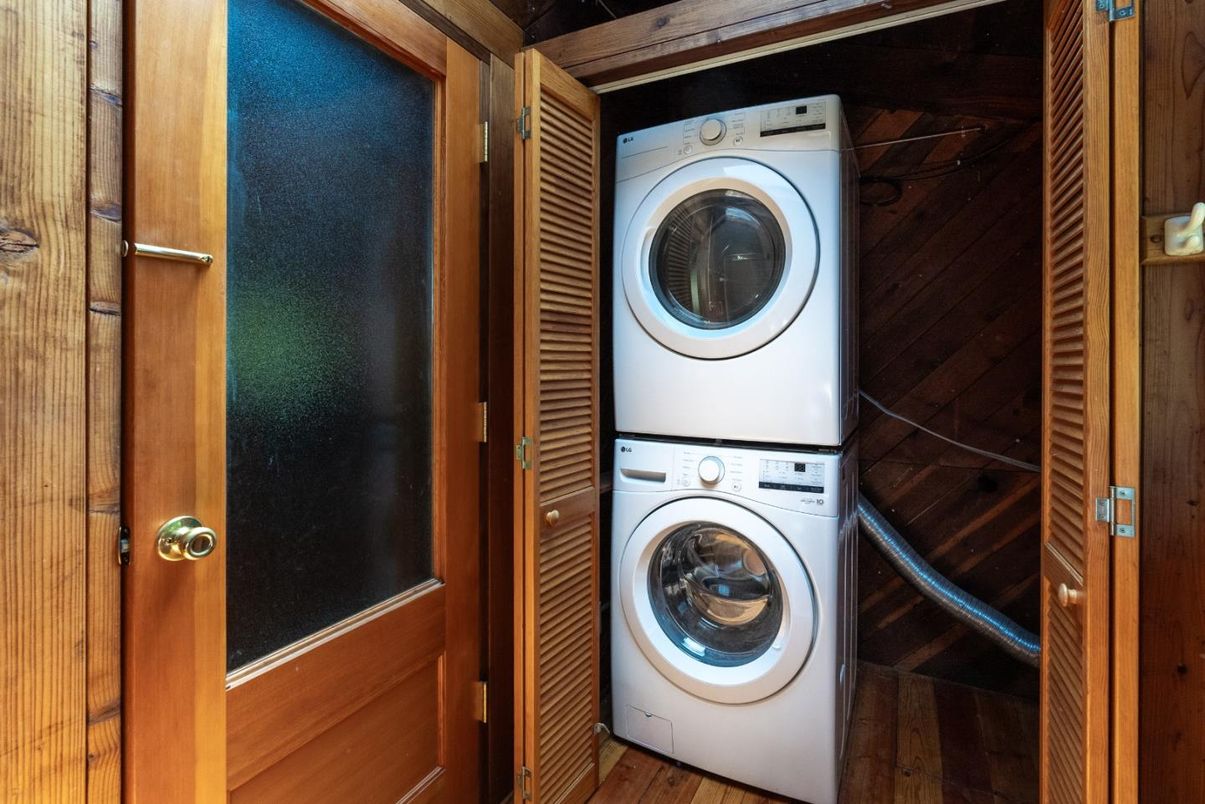 Interior, Utility Closets, Washer, Wood Texture Flooring, Wooden Walls