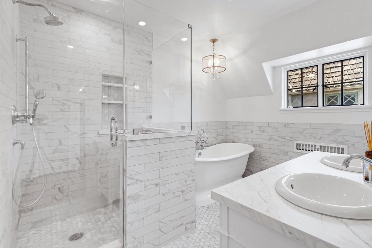 Bathroom, Dual Sink Vanities, Free Standing Baths, Glass Shower, Interior, Marble Walls, Recessed Lighting