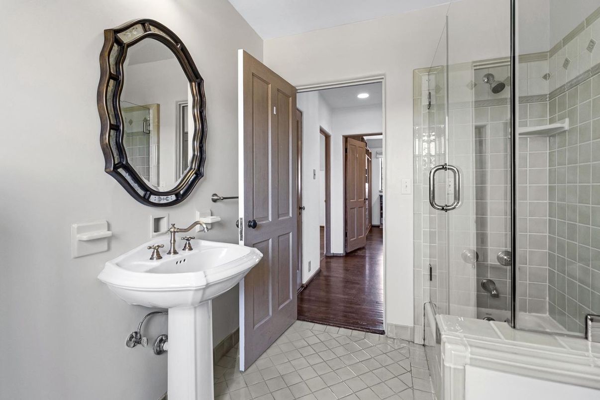 Bathroom, Dual Sink Vanities, Glass Shower, Interior, Recessed Lighting, Wood Texture Flooring