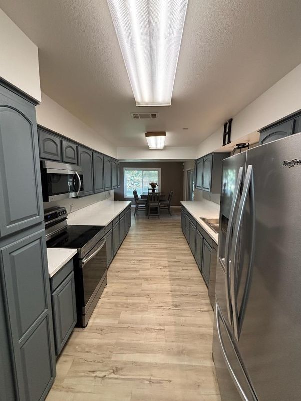 Dining room, Interior, Kitchen, Stainless Steel Appliances, Wood Texture Flooring