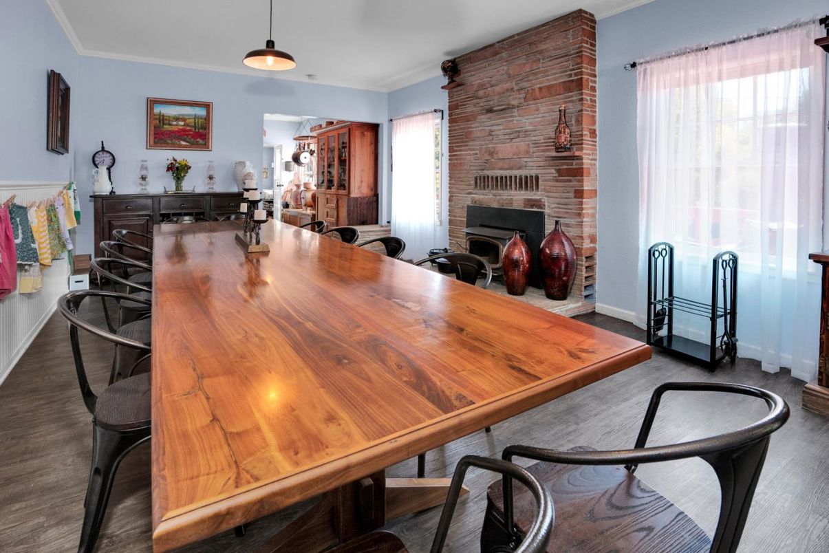 Dining room, Fireplace, Interior, Pendant Lights, Stone Walls, Wood Texture Flooring