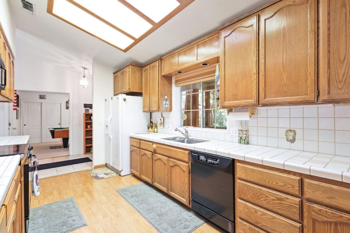 Interior, Kitchen, Tile Countertops, Wood Texture Flooring