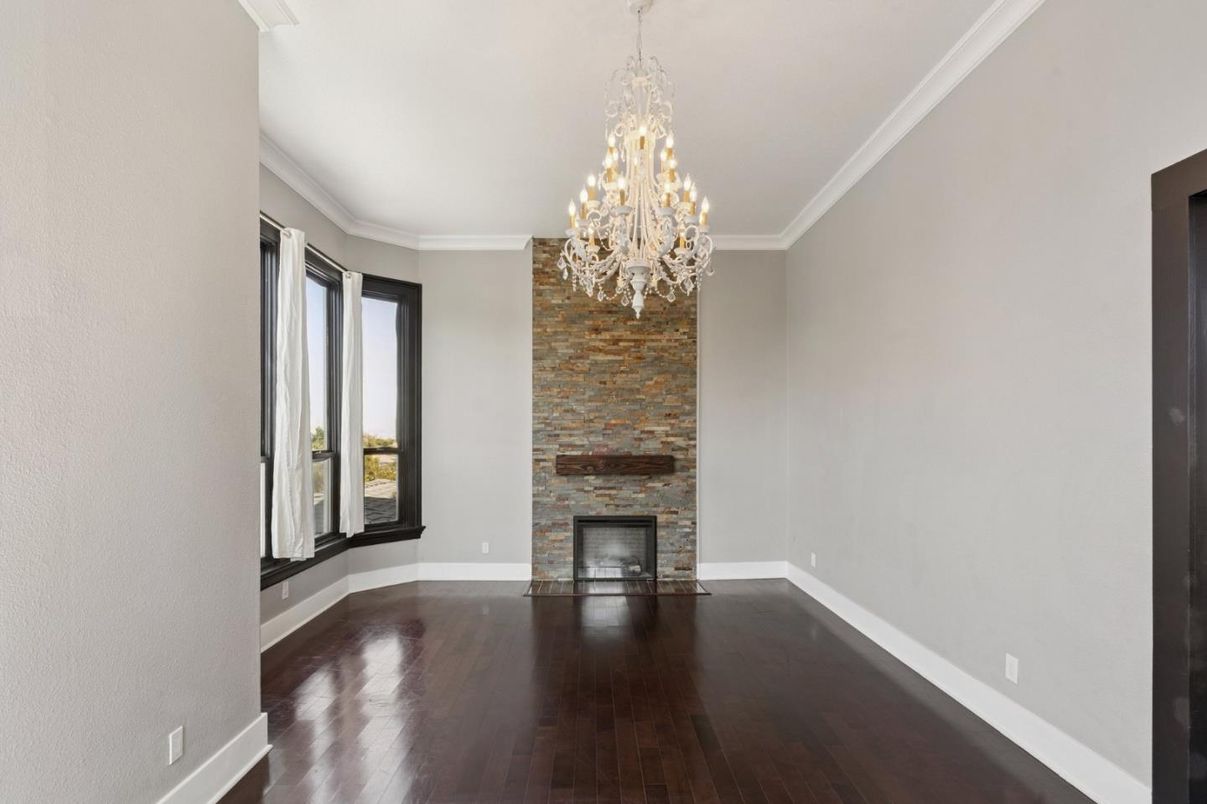 Chandelier, Empty room, Fireplace, Interior, Stone Walls, Wood Texture Flooring