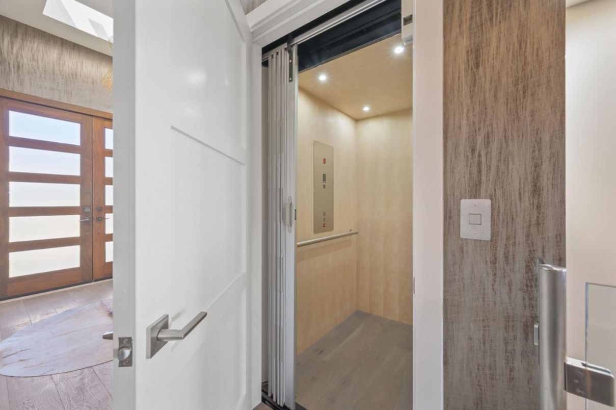 Elevator, Interior, Recessed Lighting, Wood Texture Flooring