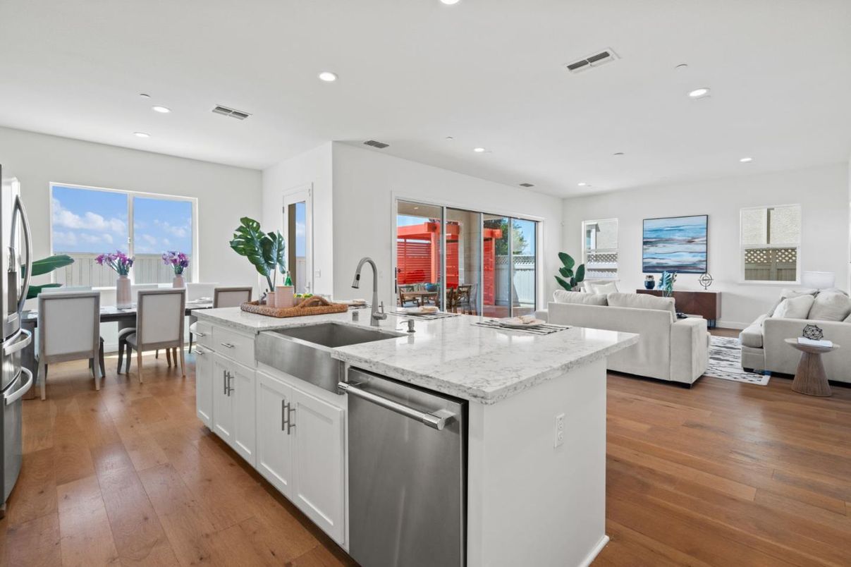Dining room, Interior, Kitchen, Living room, Recessed Lighting, Stainless Steel Appliances, Wood Texture Flooring