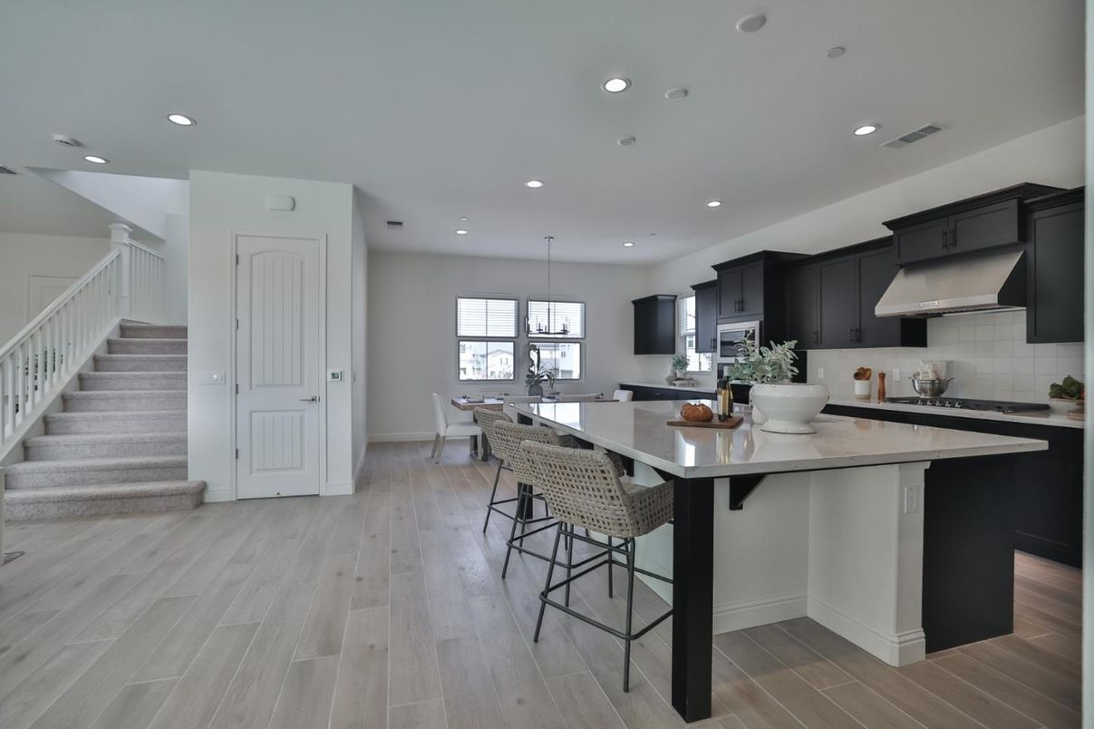 Dining room, Interior, Kitchen, Pendant Lights, Recessed Lighting, Stainless Steel Appliances, Wood Texture Flooring