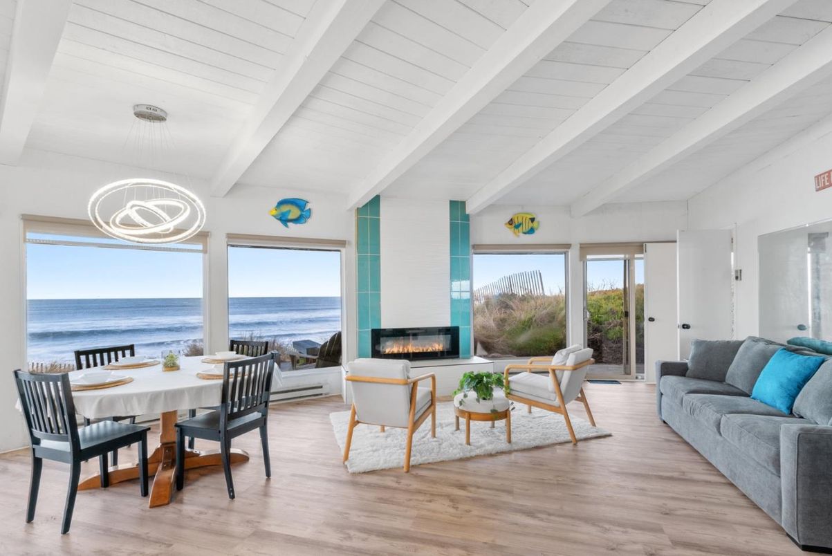 Dining room, Fireplace, Interior, Living room, Pendant Lights, Water, Wood Texture Flooring