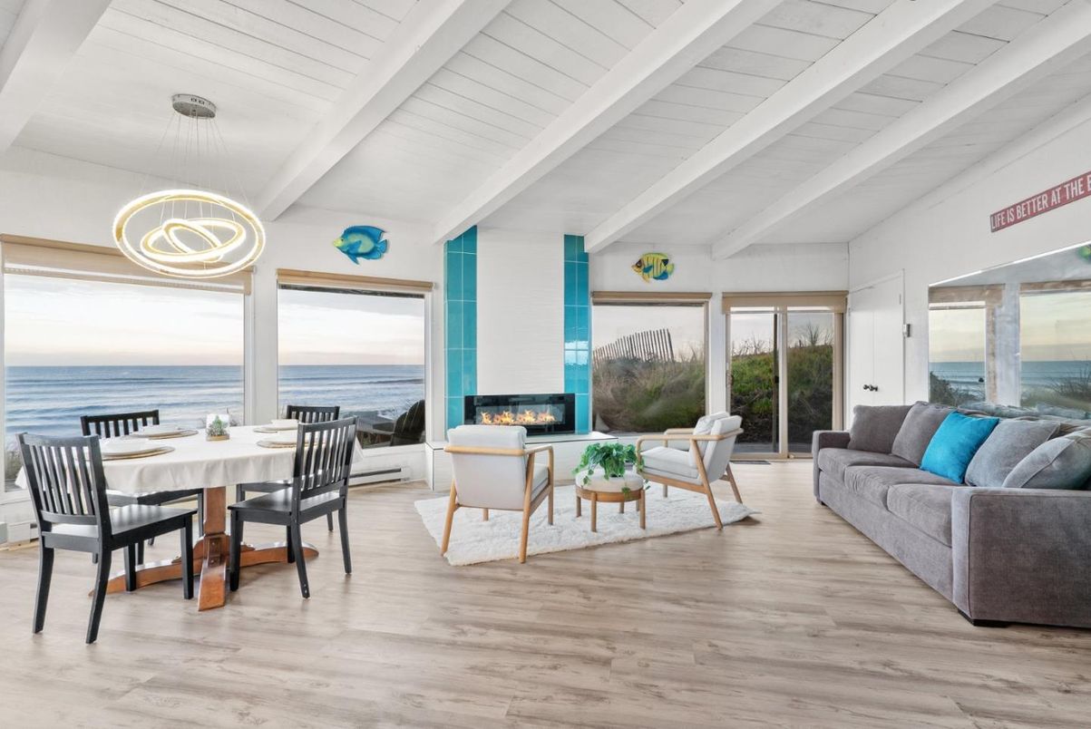 Dining room, Fireplace, Interior, Living room, Pendant Lights, Water, Wood Texture Flooring