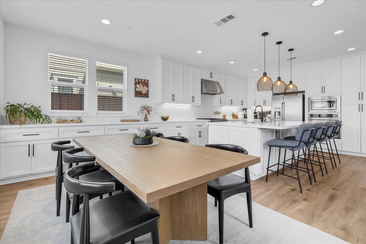 Interior, Kitchen, Pendant Lights, Recessed Lighting, Stainless Steel Appliances, Wood Texture Flooring