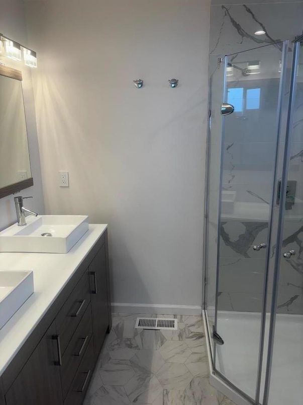 Bathroom, Dual Sink Vanities, Glass Shower, Interior, Marble, Marble Walls