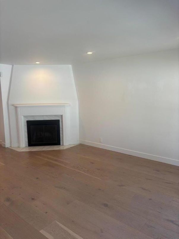 Empty room, Fireplace, Interior, Recessed Lighting, Wood Texture Flooring