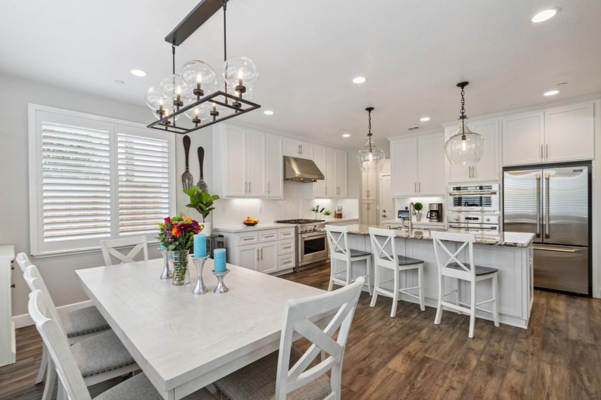 Dining room, Interior, Kitchen, Pendant Lights, Recessed Lighting, Stainless Steel Appliances, Wood Texture Flooring