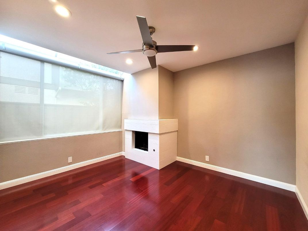Empty room, Fireplace, Interior, Recessed Lighting, Wood Texture Flooring