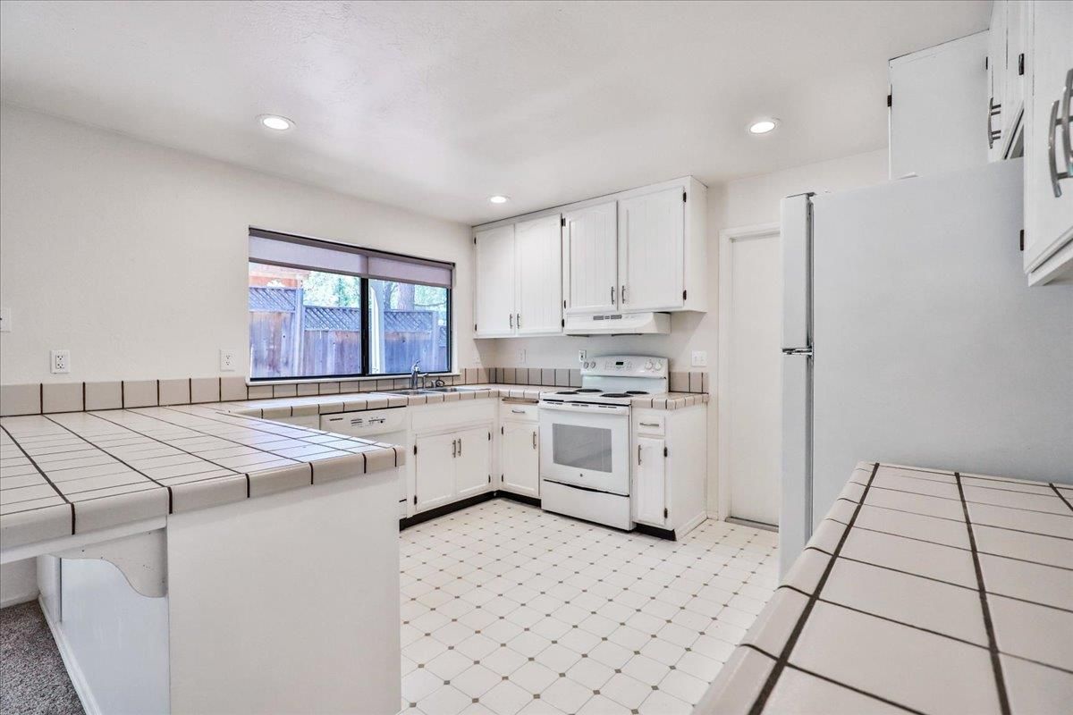 Interior, Kitchen, Recessed Lighting, Tile Countertops