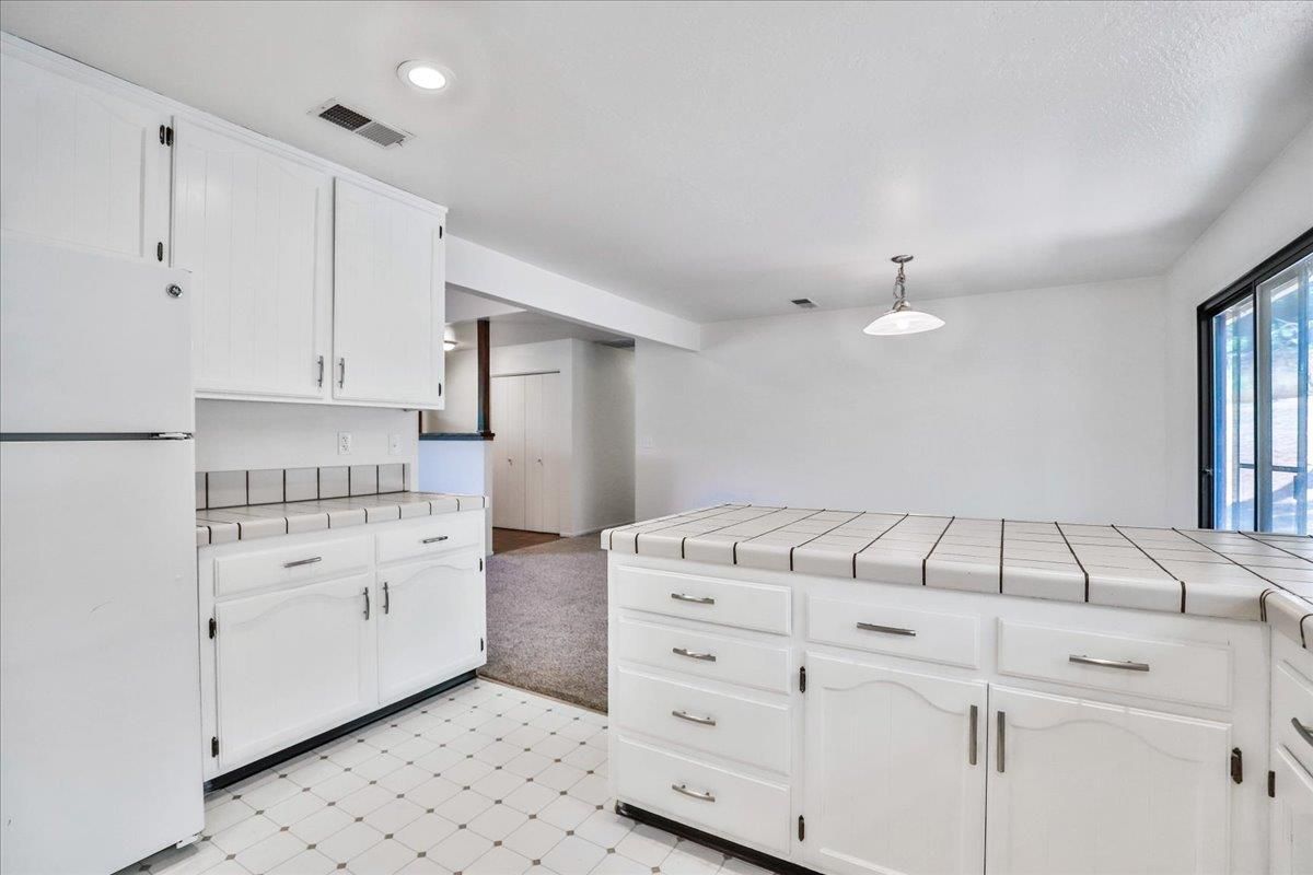 Interior, Kitchen, Recessed Lighting, Tile Countertops