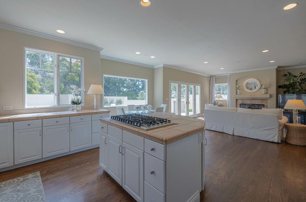 Dining room, Fireplace, Interior, Kitchen, Living room, Recessed Lighting, Tile Countertops, Wood Texture Flooring