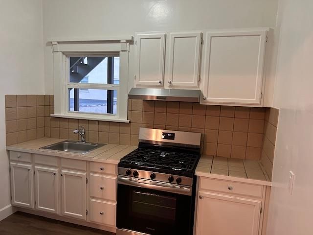 Interior, Kitchen, Tile Countertops, Wood Texture Flooring