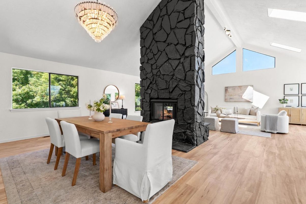 Chandelier, Dining room, Fireplace, Interior, Living room, Stone Walls, Wood Texture Flooring
