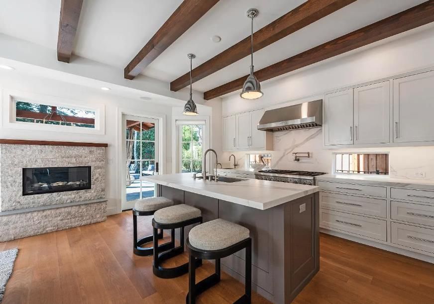 Fireplace, Interior, Kitchen, Pendant Lights, Recessed Lighting, Stainless Steel Appliances, Wooden Beams, Wood Texture Flooring