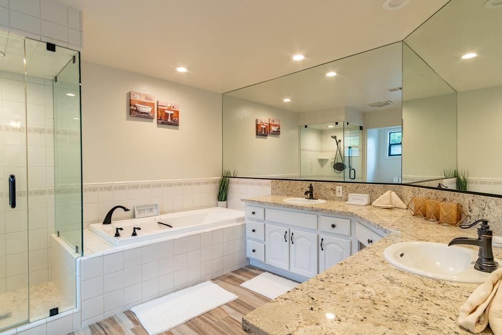 Bathroom, Dual Sink Vanities, Glass Shower, Interior, Recessed Lighting, Wood Texture Flooring