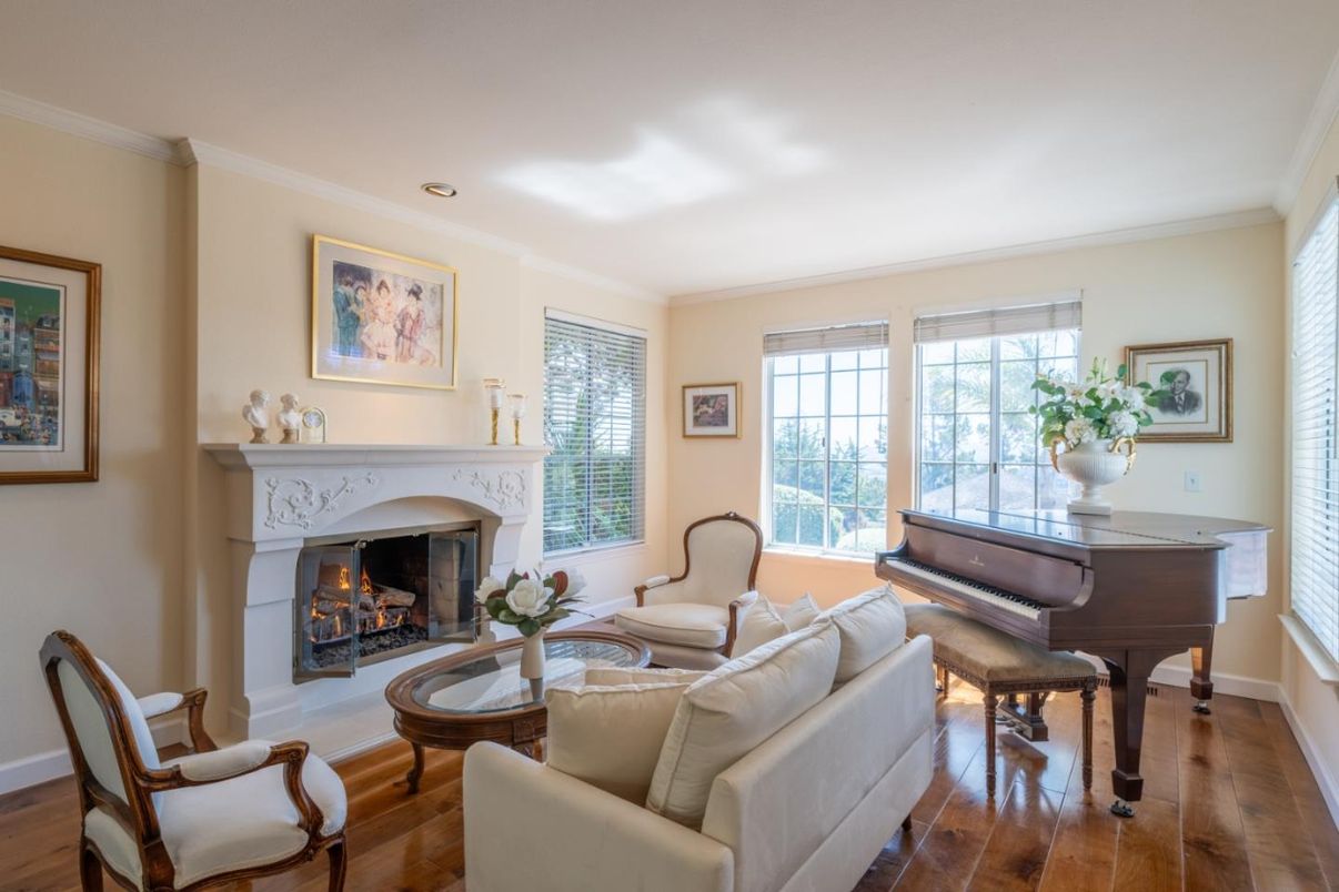 Fireplace, Interior, Living room, Piano, Recessed Lighting, Wood Texture Flooring