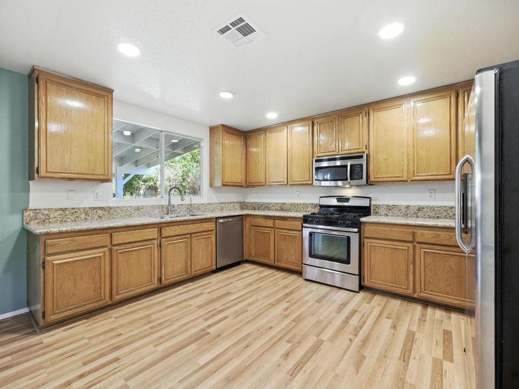 Interior, Kitchen, Recessed Lighting, Stainless Steel Appliances, Wood Texture Flooring
