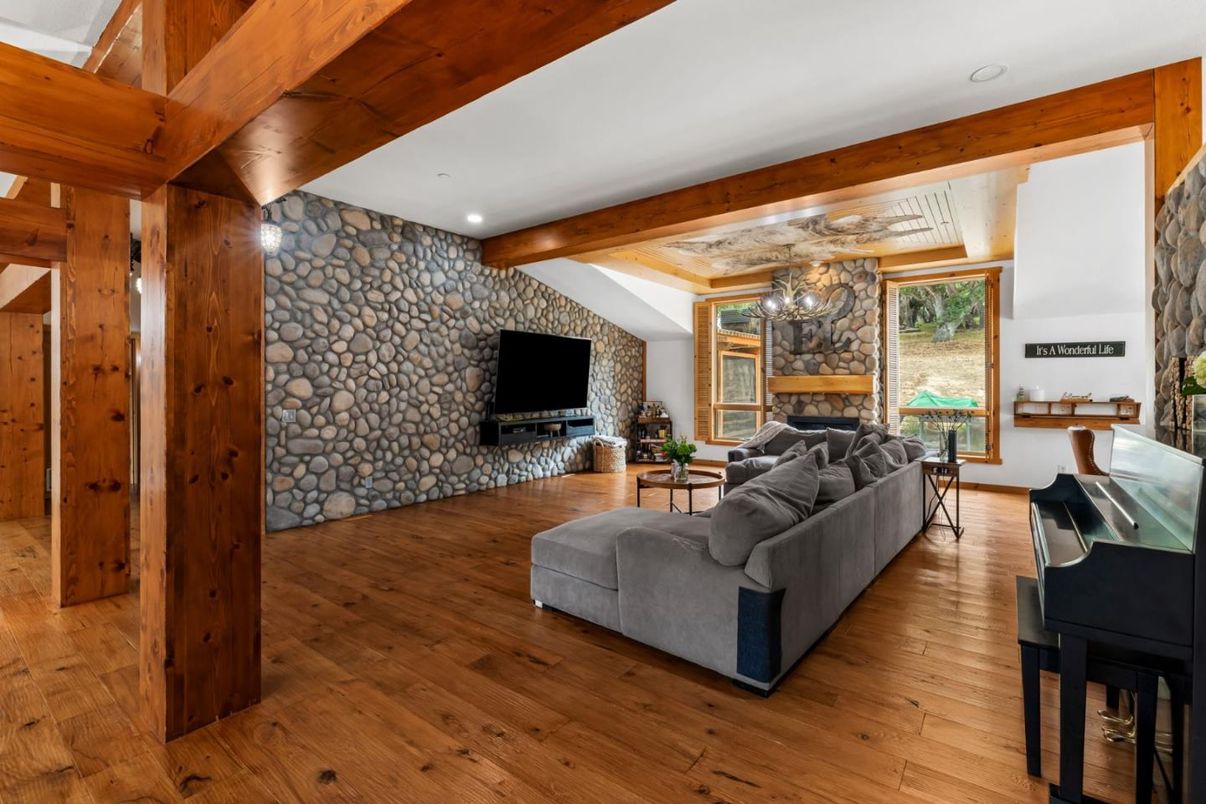 Fireplace, Interior, Living room, Piano, Recessed Lighting, Stone Walls, Wooden Beams, Wood Texture Flooring